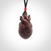 This pendant is handcrafted from Red Jasper Stone. It replicates a human heart. It is supplied with an adjustable black cord.